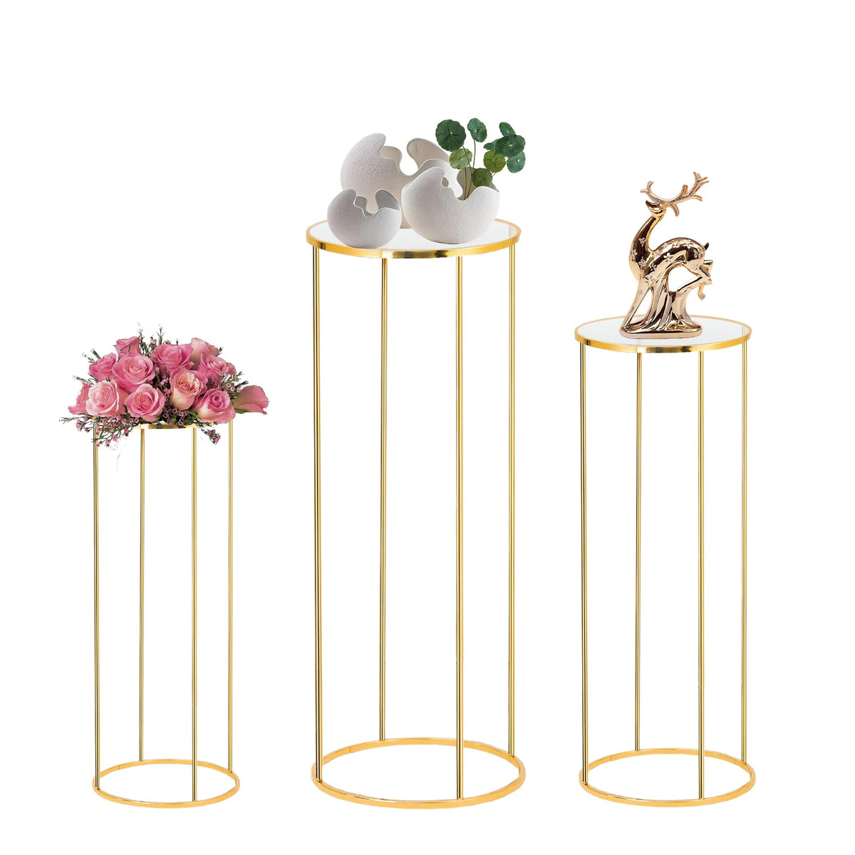 Latywen front view of three gold cylinder pedestal stands, elevates decor