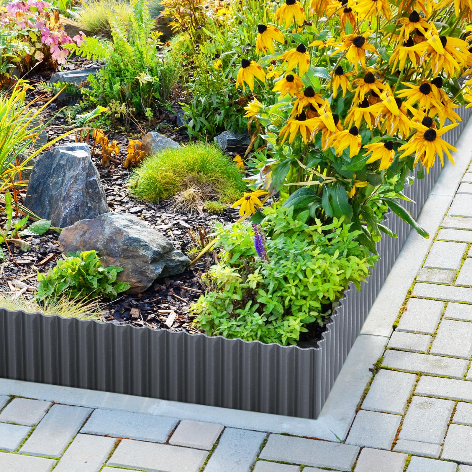 LAVEVE edging height shown with ruler illustrating 12-inch containment benefit