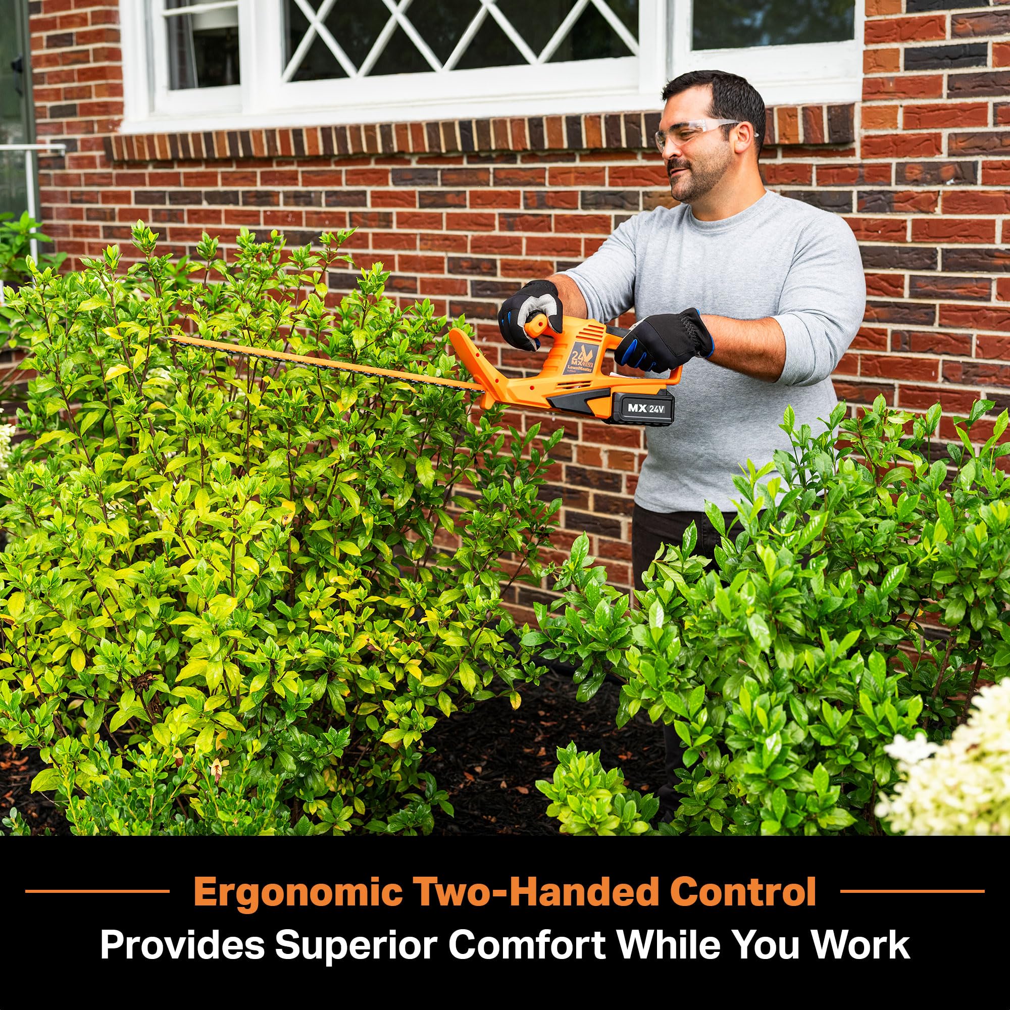 LawnMaster CLHT2422 being used with two-handed grip for comfortable trimming