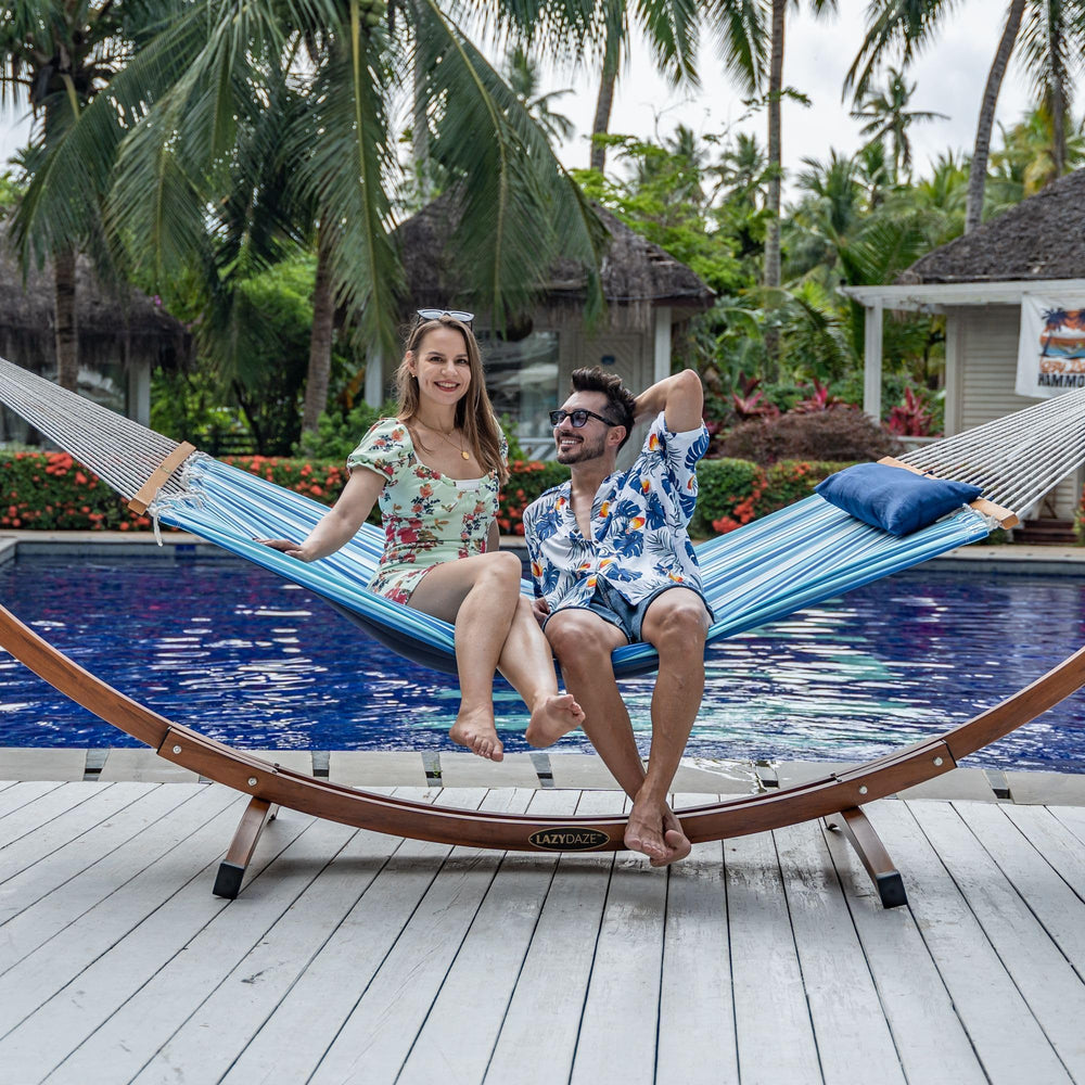 Lazy Daze hammock set up in backyard patio showing relaxed outdoor lounging for two people