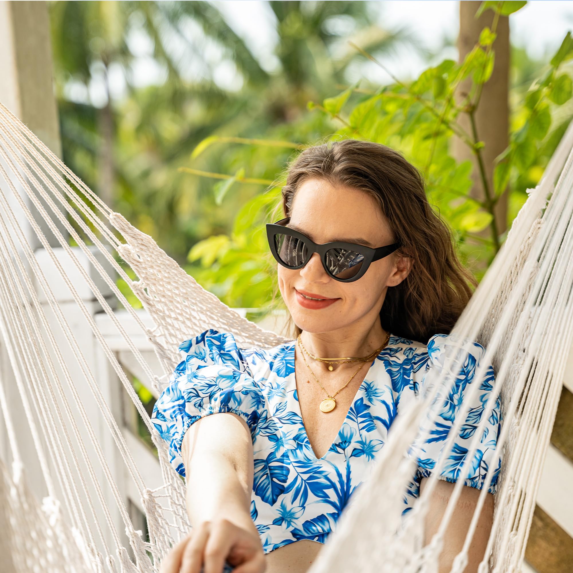 Lazy Daze Hammocks neutral-tone chair in garden lifestyle scene, blends with decor