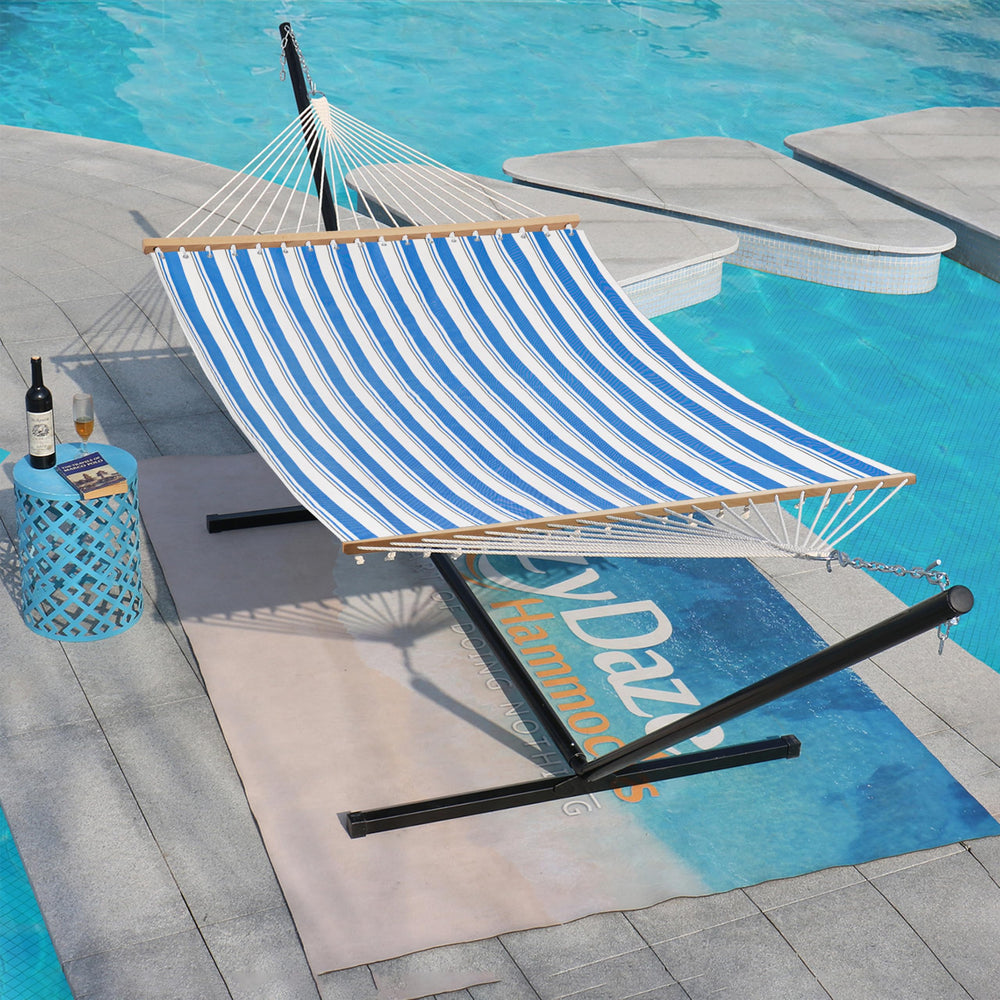 Lazy Daze hammock on patio by pool showing relaxing outdoor lifestyle benefit