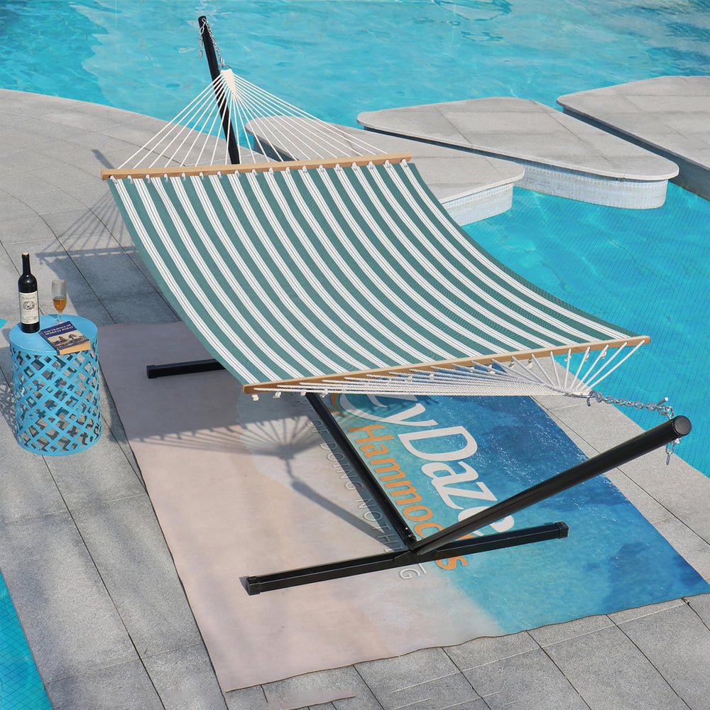 Lazy Daze hammock set on patio with cushions and table, stylish comfortable outdoor setup