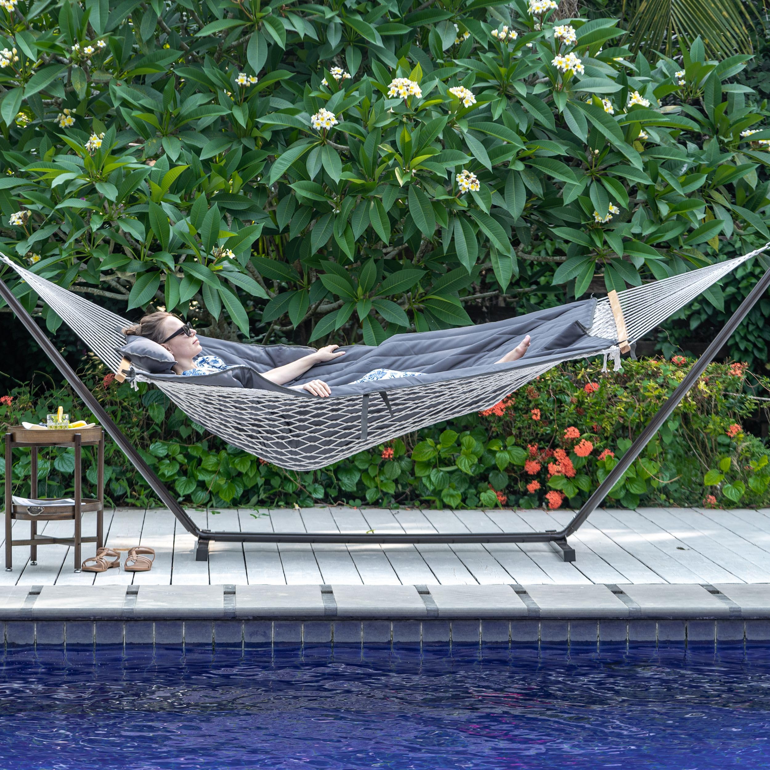 Lazy Daze two adults using hammock demonstrating roomy two-person capacity