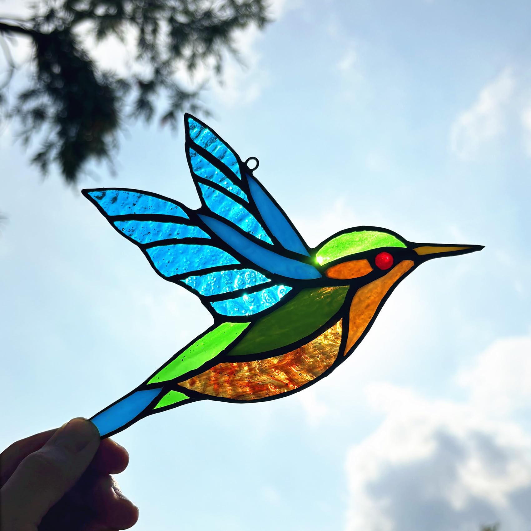 Lcensp hummingbird suncatcher hanging in window adding color and reducing bird collisions