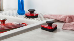 Le Creuset close-up of nylon bristles and handle highlighting gentle effective cleaning