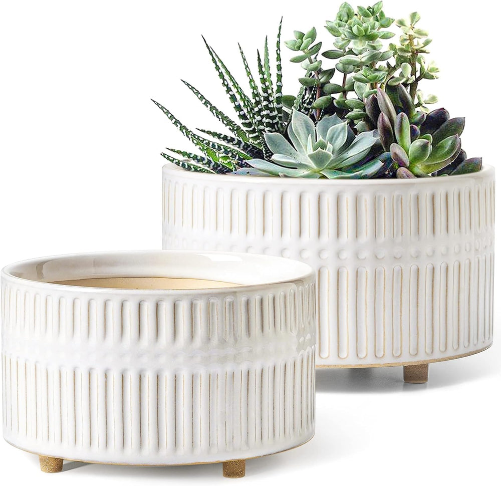 LE TAUCI planters front view showing set of two and reactive white glaze benefit