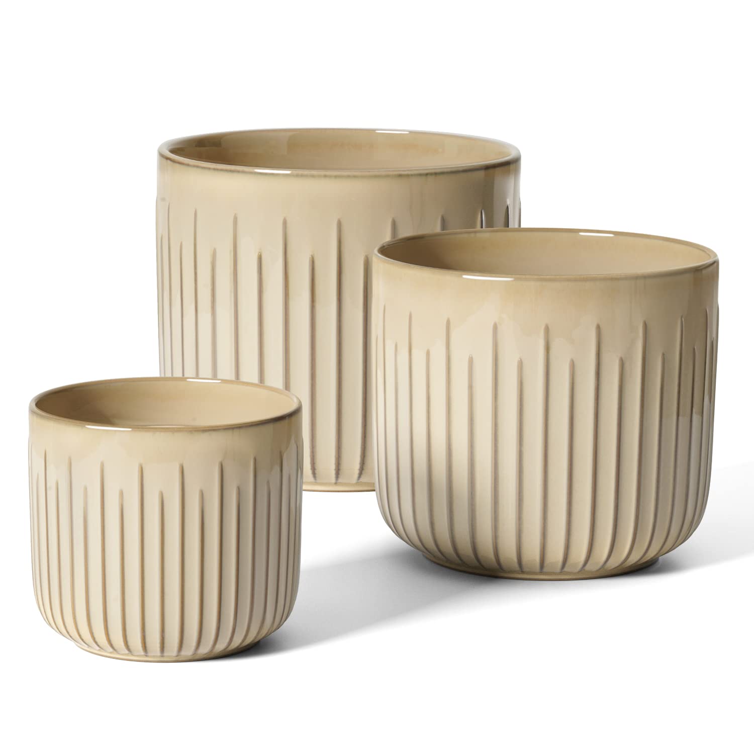 LE TAUCI front view of three sand beige planters, cohesive decor appeal