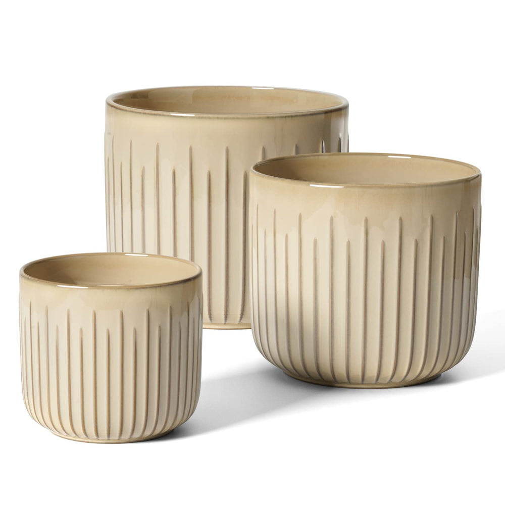 LE TAUCI front view of three sand beige planters, cohesive decor appeal