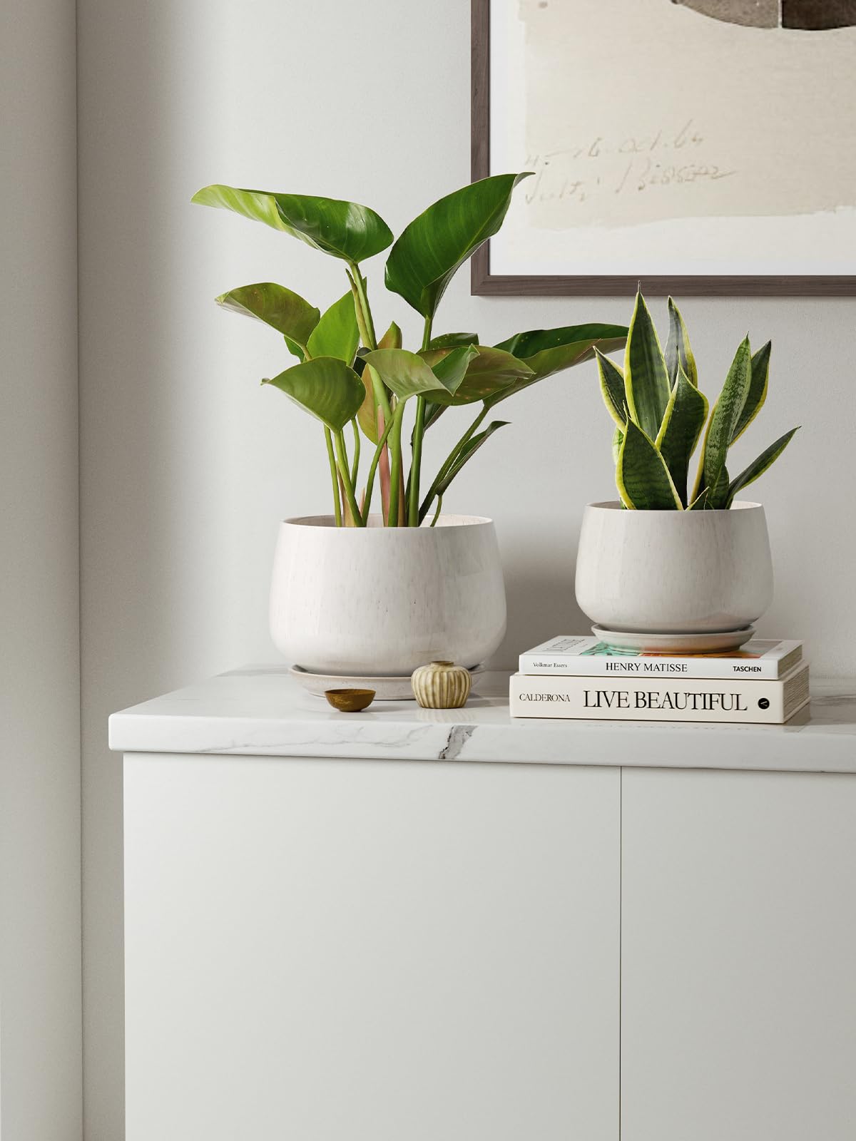 LE TAUCI planters on patio under sun, weather-resistant ceramic for outdoor use