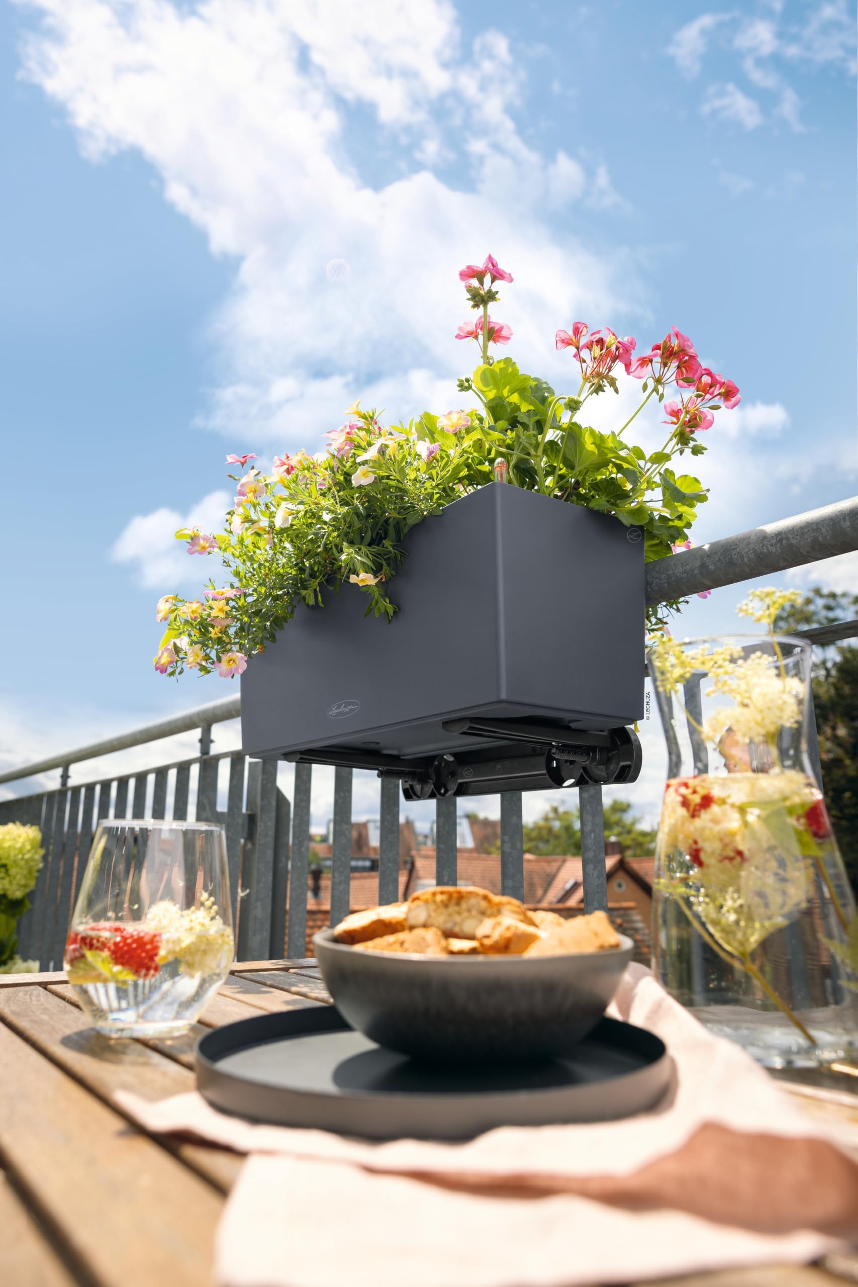 Lechuza bracket mounted on balcony railing illustrating stable planter support