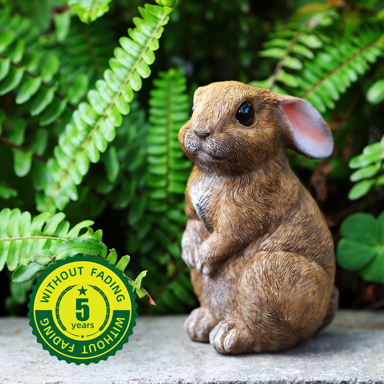 LEGIFO bunnies beside hand for scale demonstrating compact size