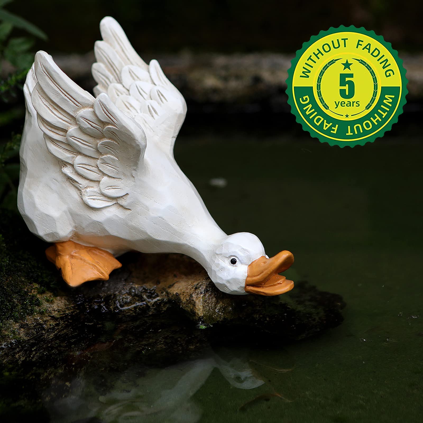 LEGIFO duck statues staged in a flowerbed adding whimsical curb appeal