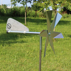 Lehman's windmill installed in garden demonstrating mole-deterrent coverage