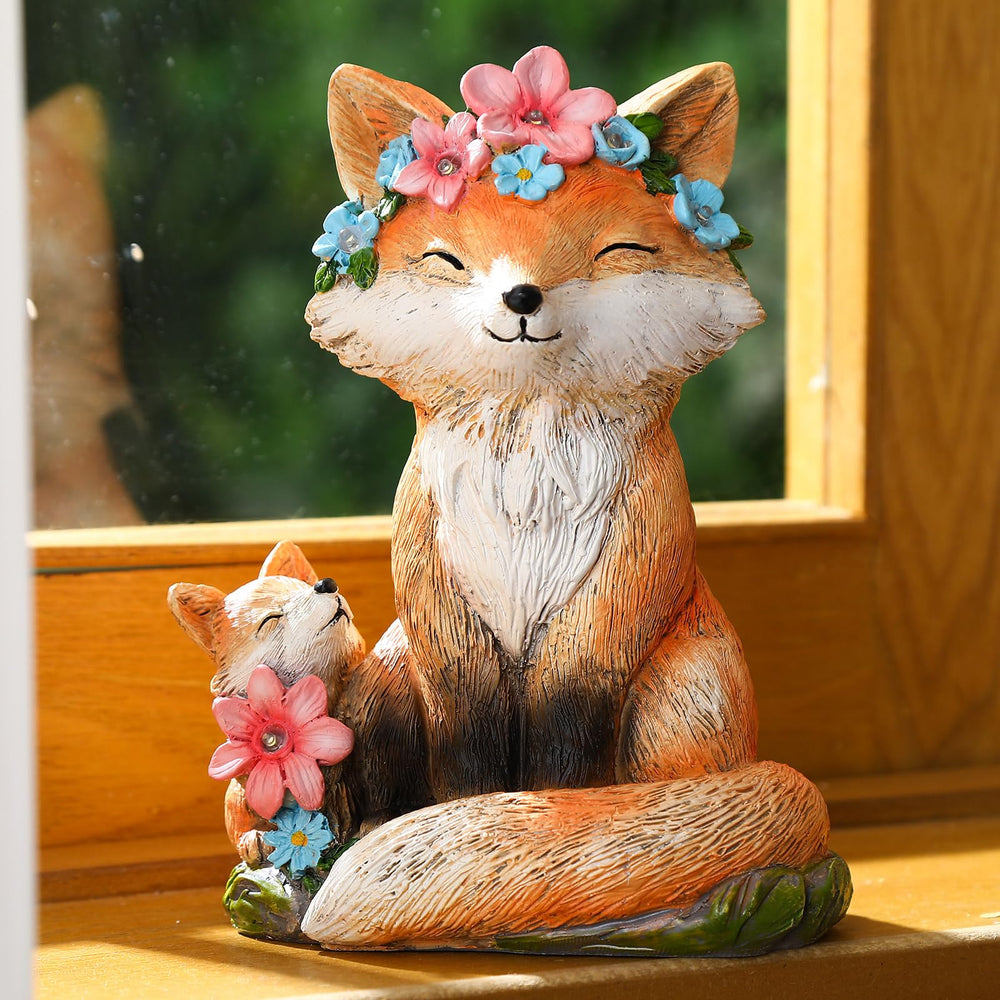 Leinuosen fox statue next to hand for size comparison demonstrating compact 7.87x5.51 inches