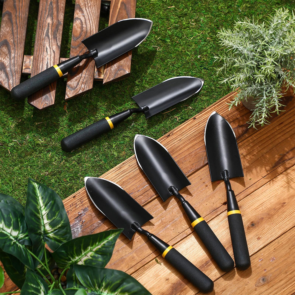 Leritón trowel in use planting seedlings showing precise soil control and minimal root damage