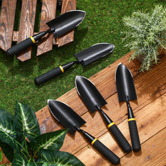 Leritón trowel in use planting seedlings showing precise soil control and minimal root damage