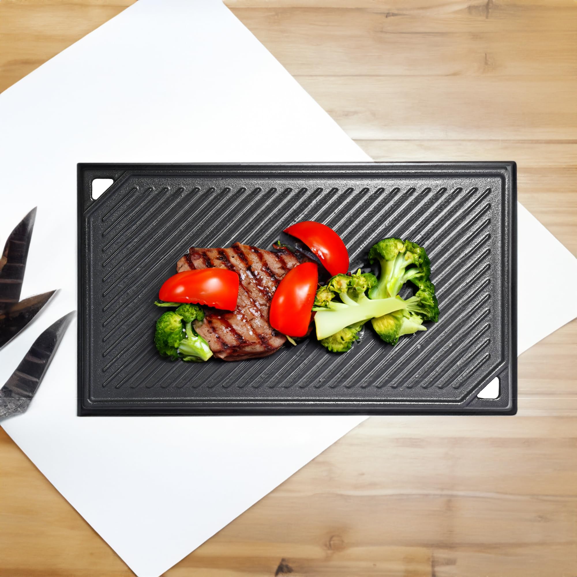 Leship griddle next to utensils showing scale and convenient kitchen fit