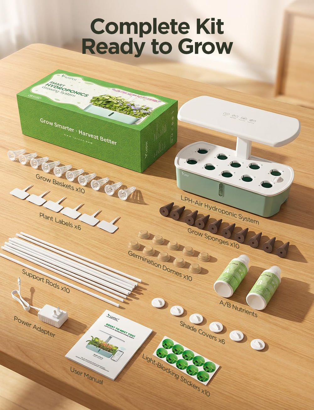 LETPOT next to fruit for scale showing space-saving compact footprint