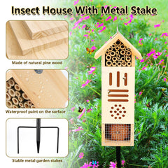 Lettry mounted on metal stake in flowerbed attracting pollinators and beneficial insects
