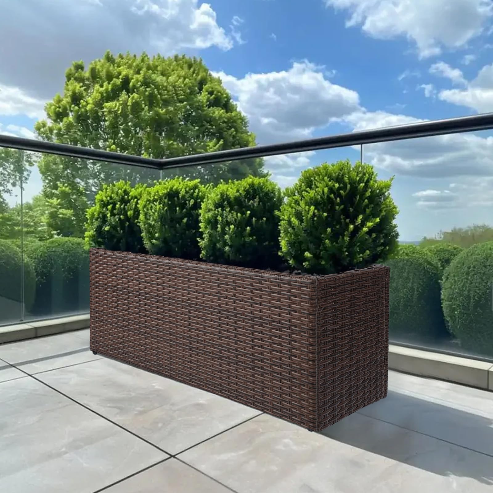 LEWIS&WAYNE planter next to outdoor chair to show scale and placement guidance