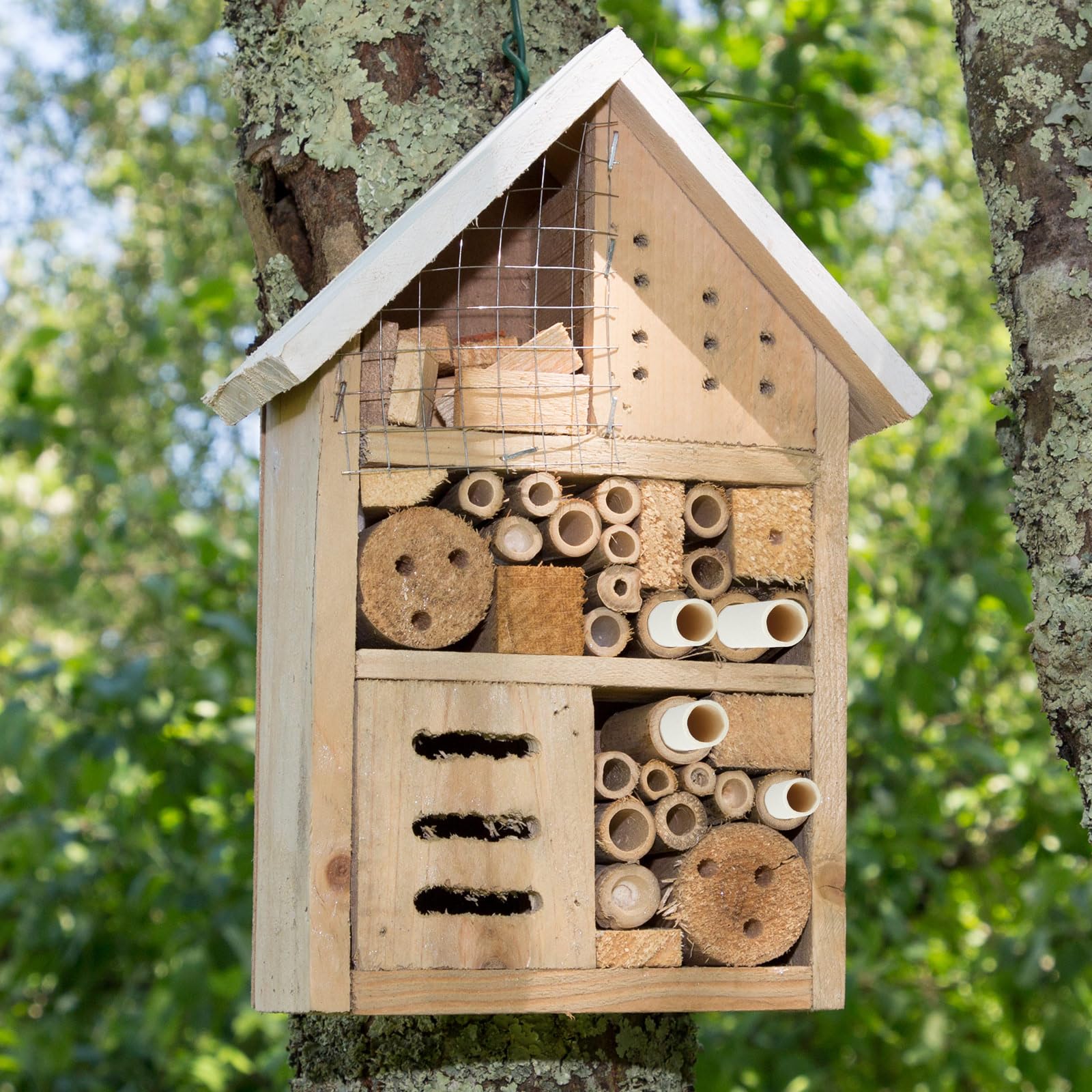 Lewtemi bee tubes in a garden scene encouraging more pollination