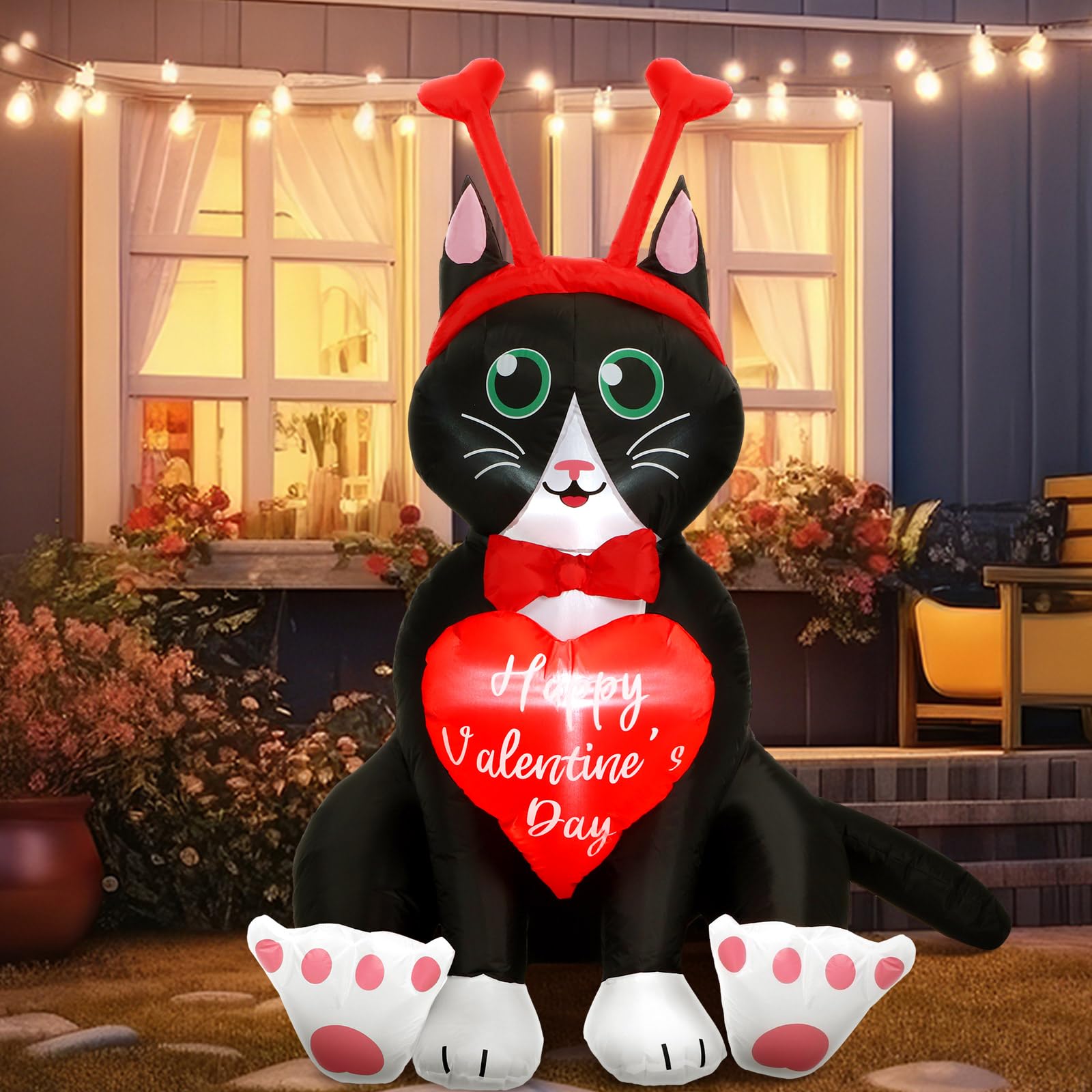 Leyndo front view of cat inflatable showing shape and festive bow for curb appeal