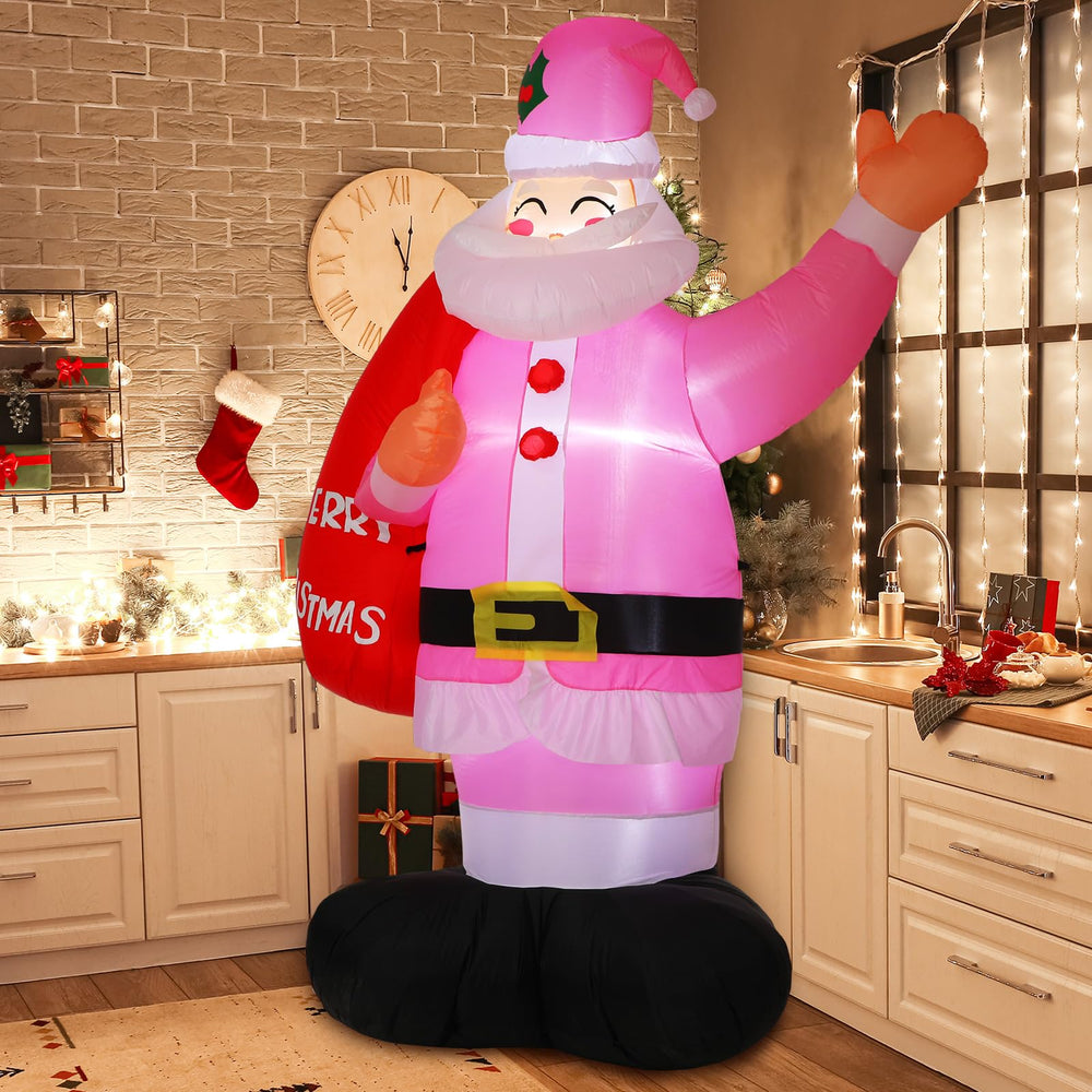 Leyndo pink Santa beside a person to show eight-foot height impact