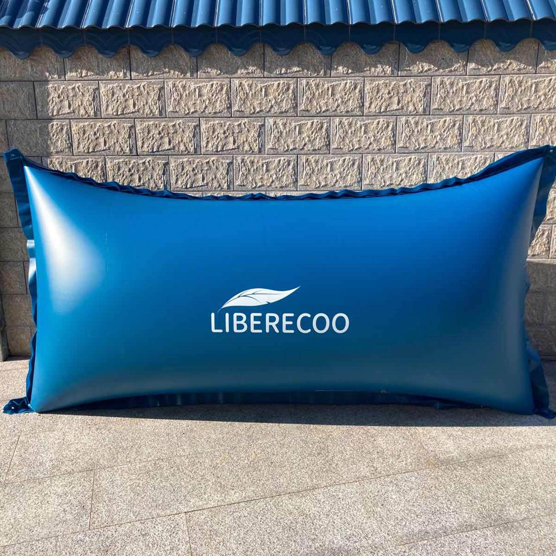 LIBERECOO pillow being cleaned and folded for compact off-season storage