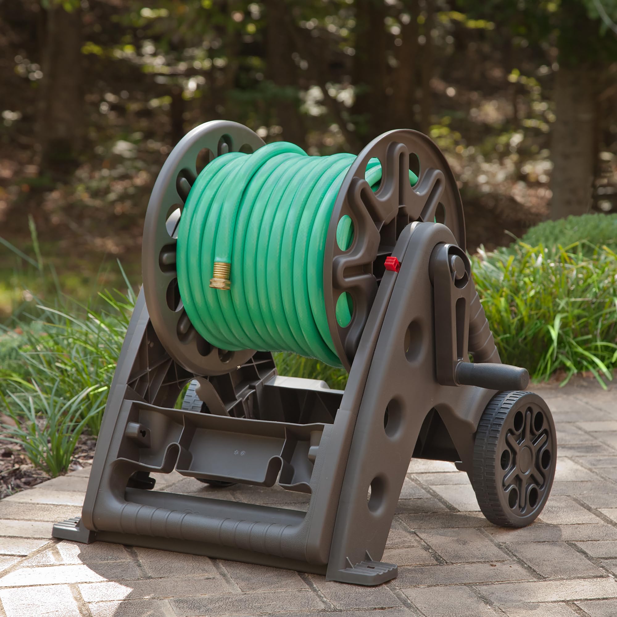 Liberty Garden cart in garden being rolled showing convenient portability benefit