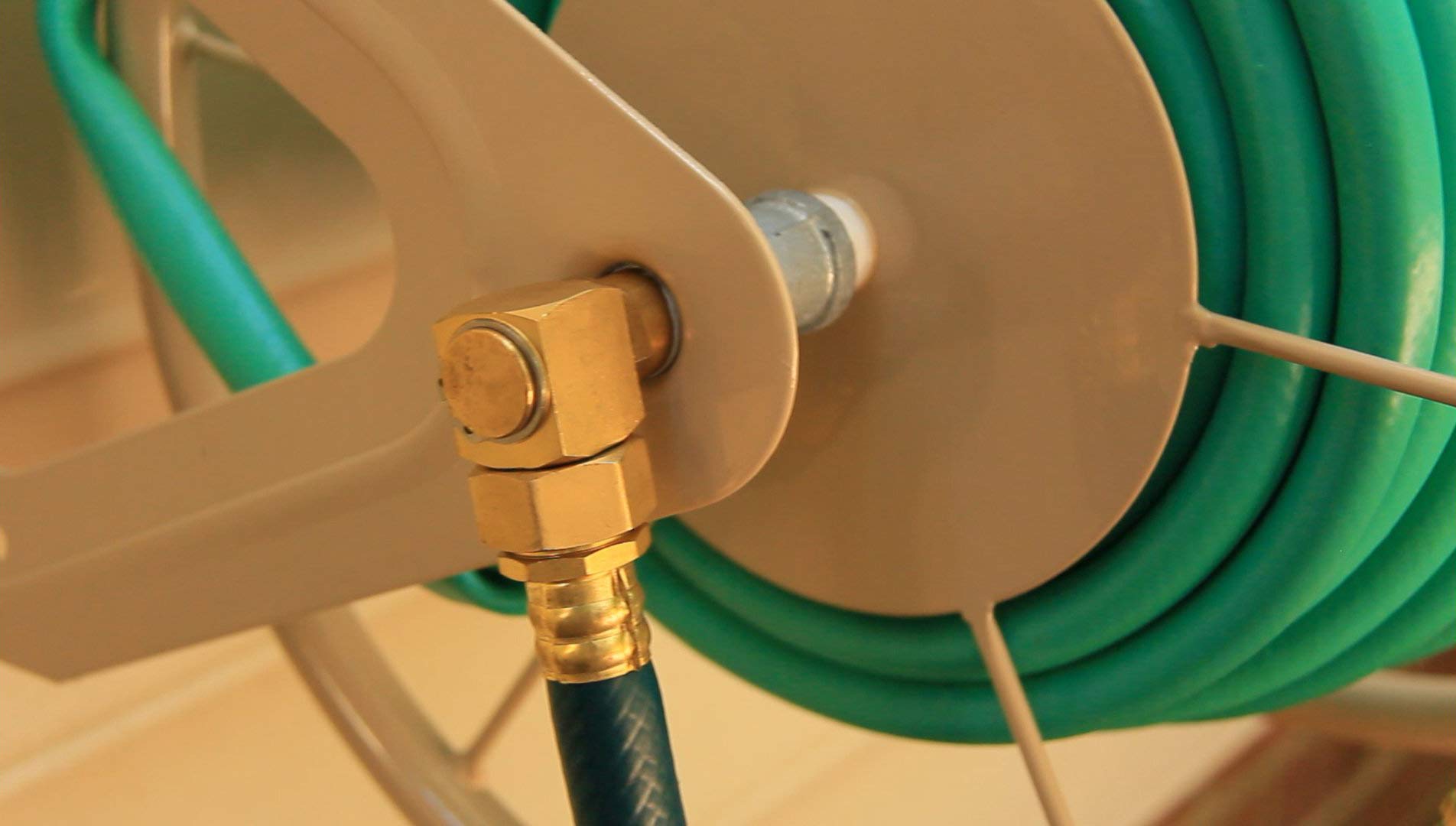 Liberty Garden leader hose connection close-up offering fast-start watering