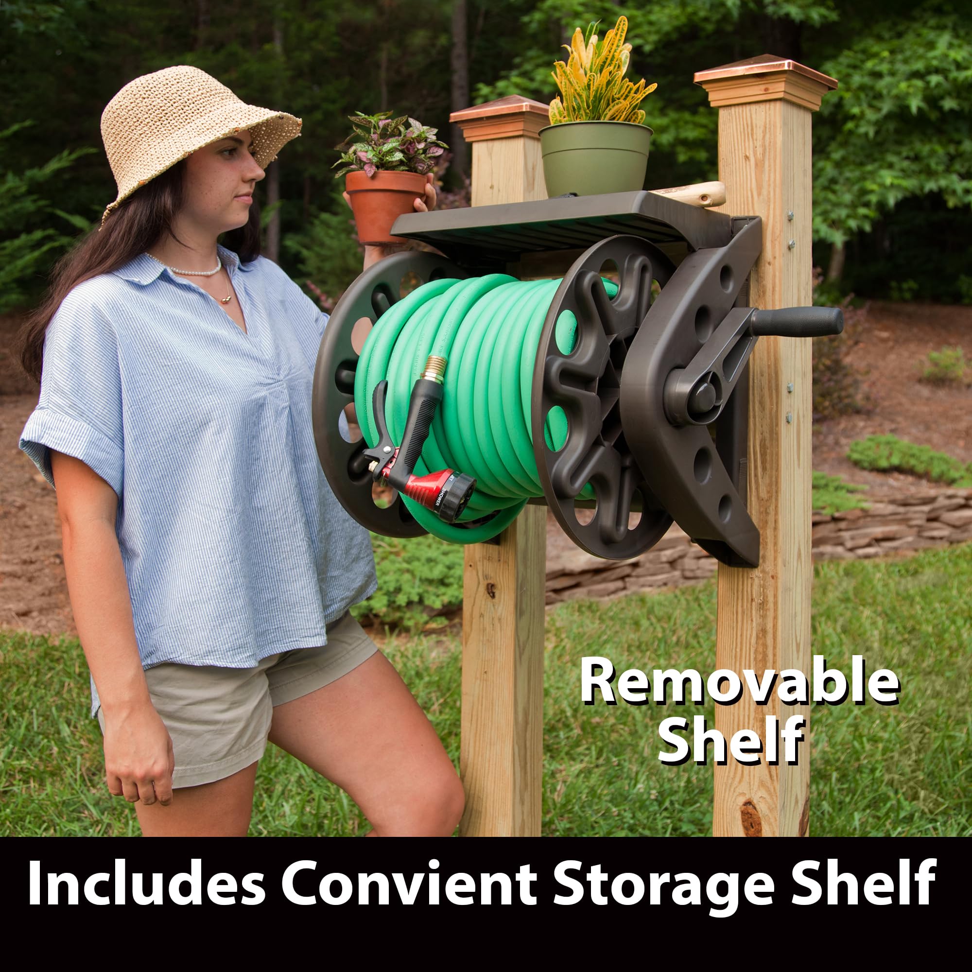 Liberty Garden reel mounted on exterior wall in garden saving ground space