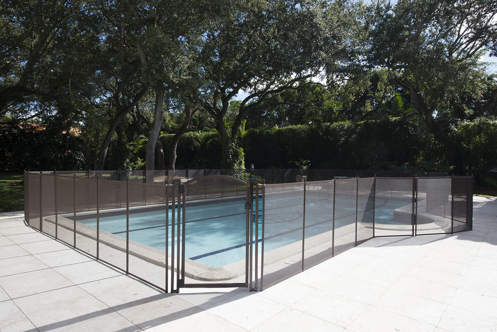 Life Saver installation poolside showing assembled fence and removable safety barrier