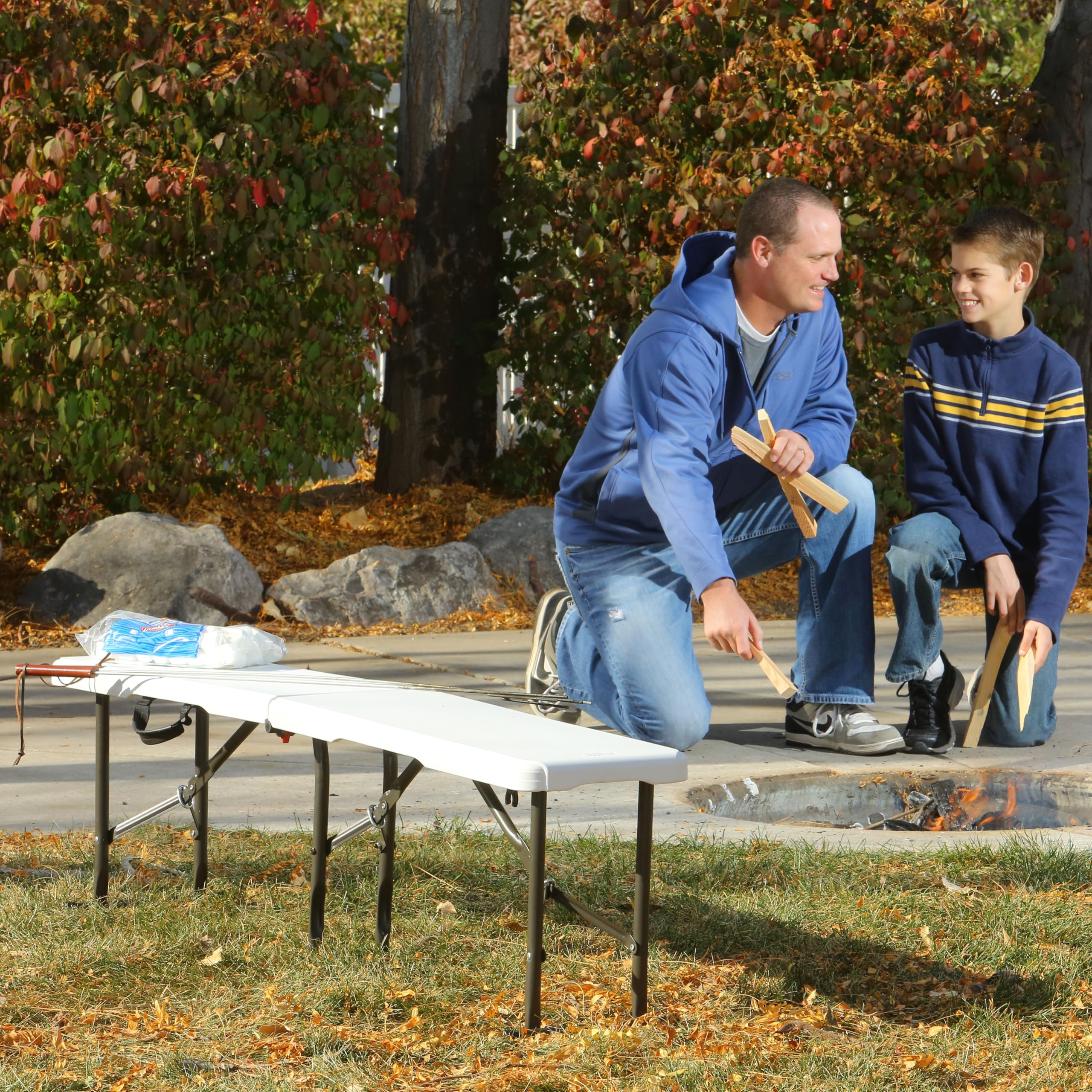 LIFETIME bench in use at soccer sideline offering portable seating for teams