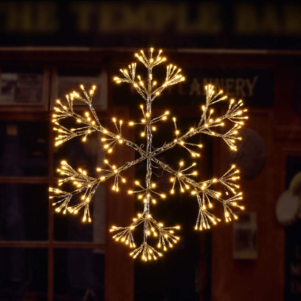 LIGHTSHARE front view of 24-inch starburst snowflake lighting, creates focal holiday glow