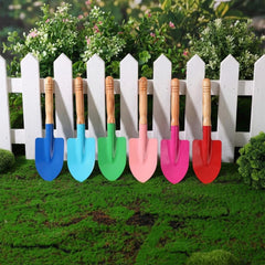 Liliful shovel next to ruler displaying 23 cm size for scale