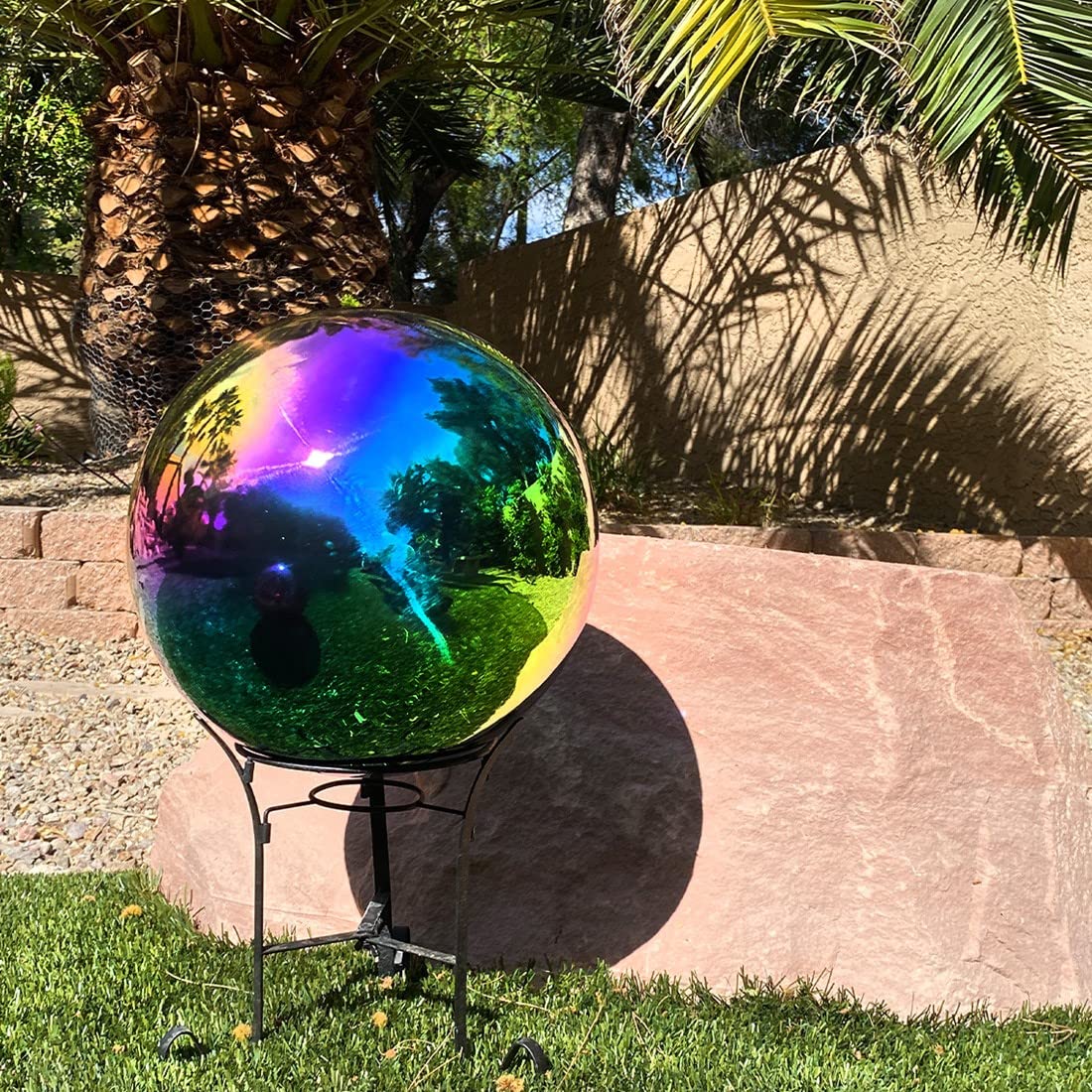 Lily's Home gazing globe nestled in decorative bowl for indoor accent