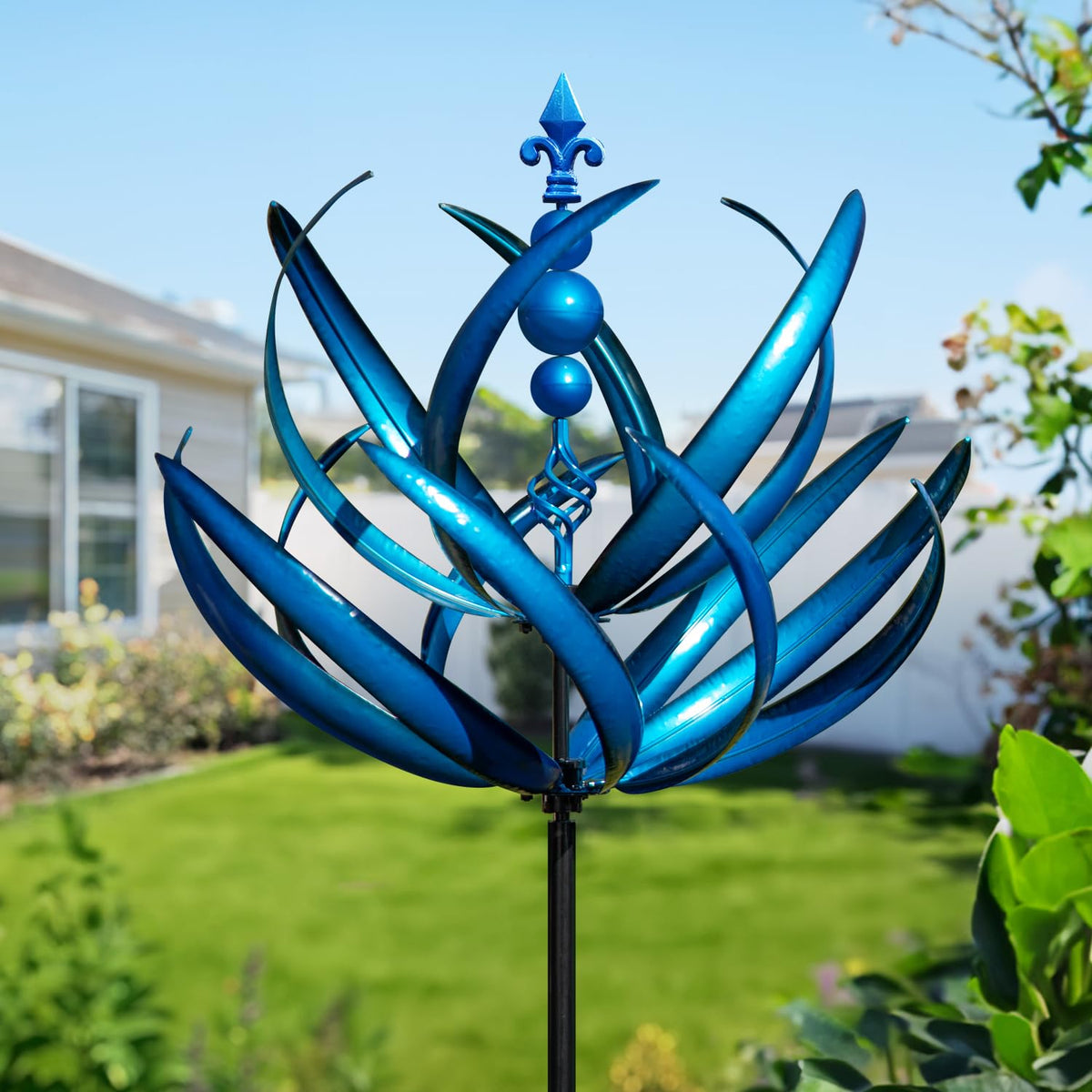 LimeHill front view of large wind spinner showing full motion and curb appeal
