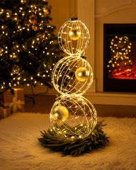 Lineshading front view of three gold LED spheres highlighting festive curb appeal