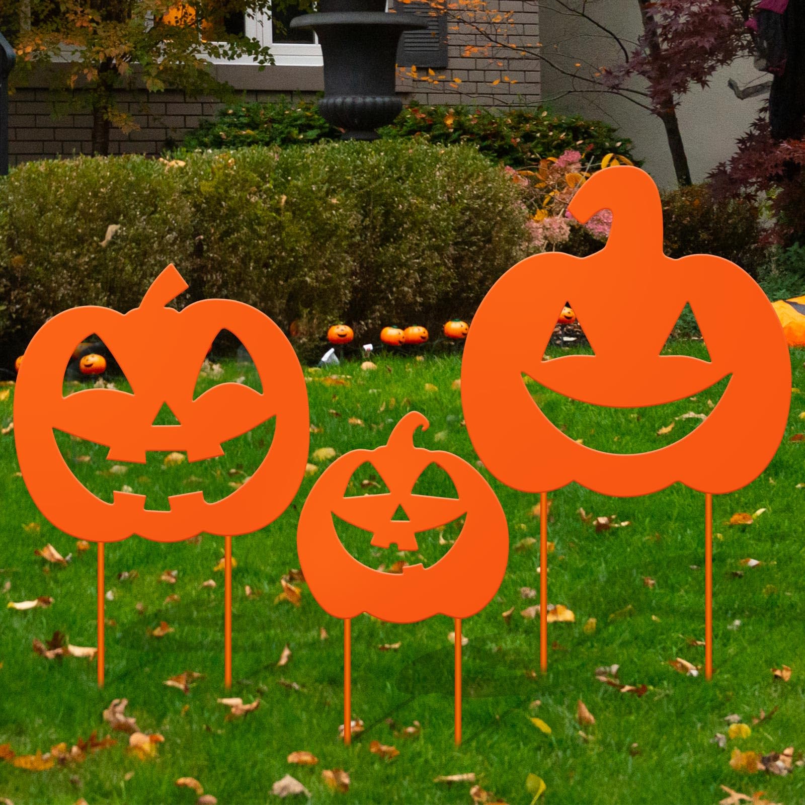 Lingvee front view of three pumpkin stakes showing festive curb appeal