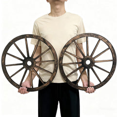 linsuo wagon wheels displayed on a patio wall creating vintage ambiance