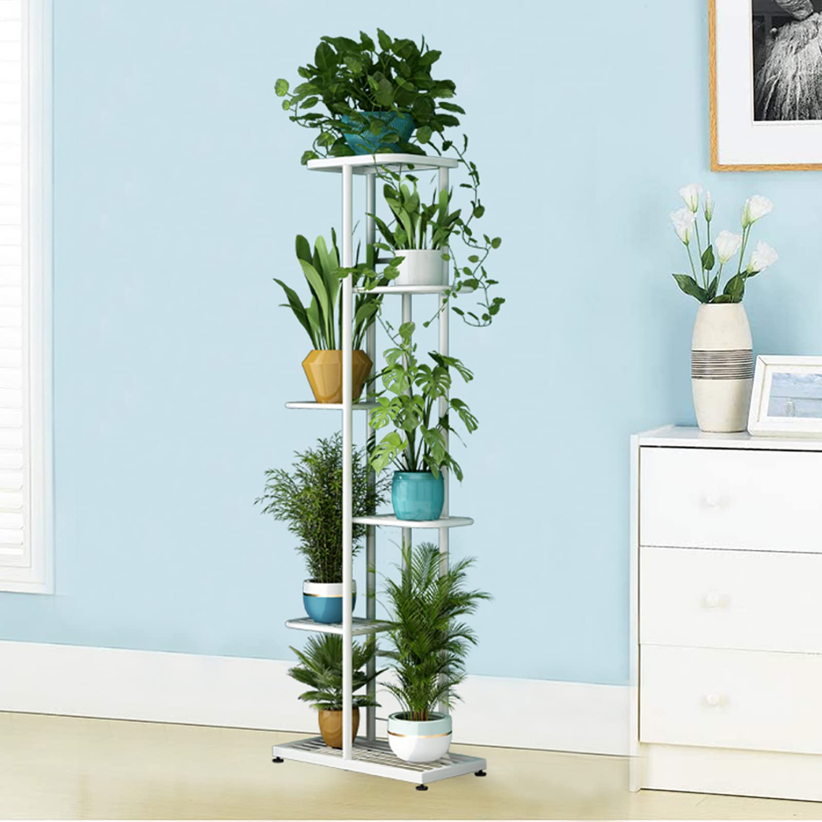LINZINAR stand used with photos and trinkets showing multiuse display benefit