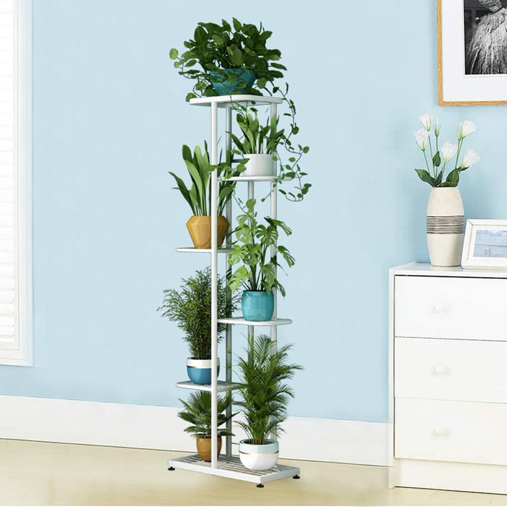 LINZINAR stand used with photos and trinkets showing multiuse display benefit