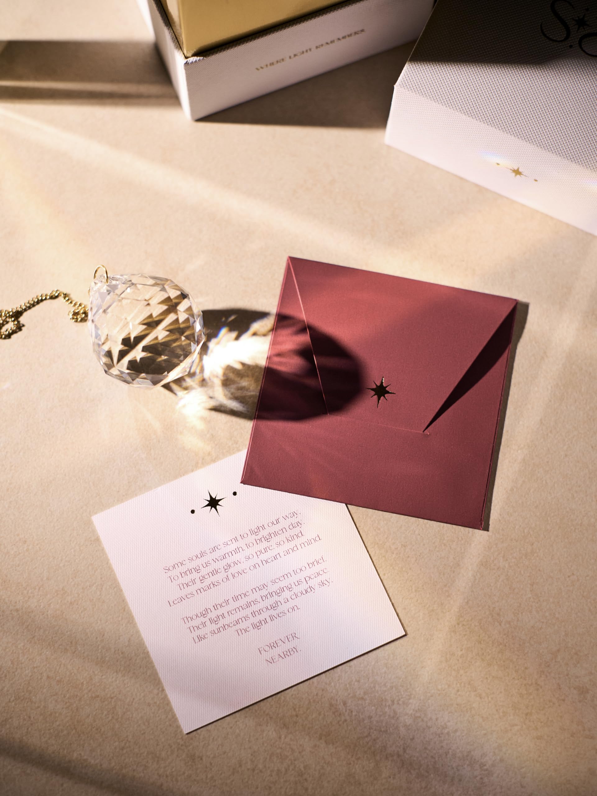 LISS memorial suncatcher styled on a shelf as a discreet remembrance display at home
