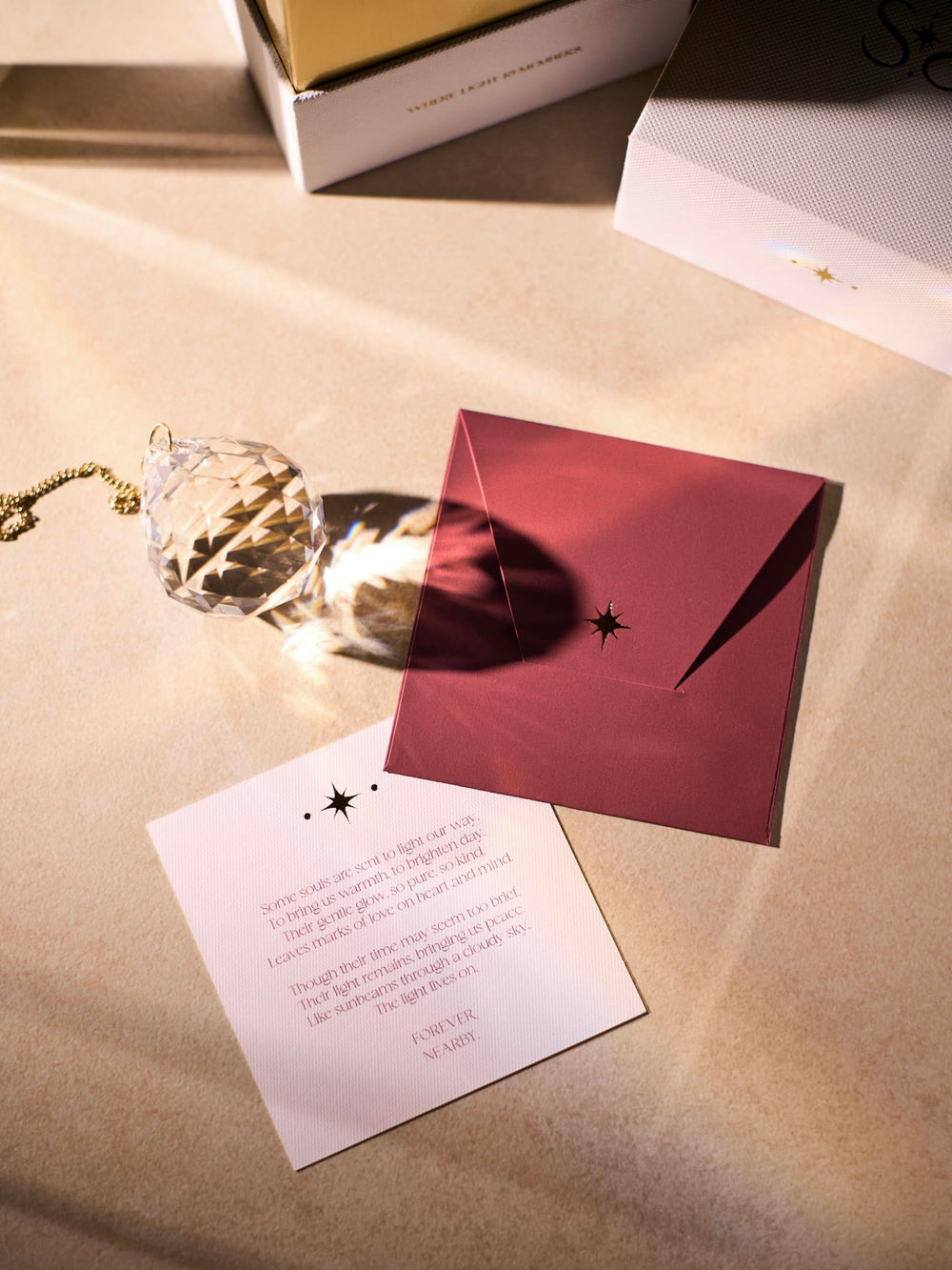 LISS memorial suncatcher styled on a shelf as a discreet remembrance display at home