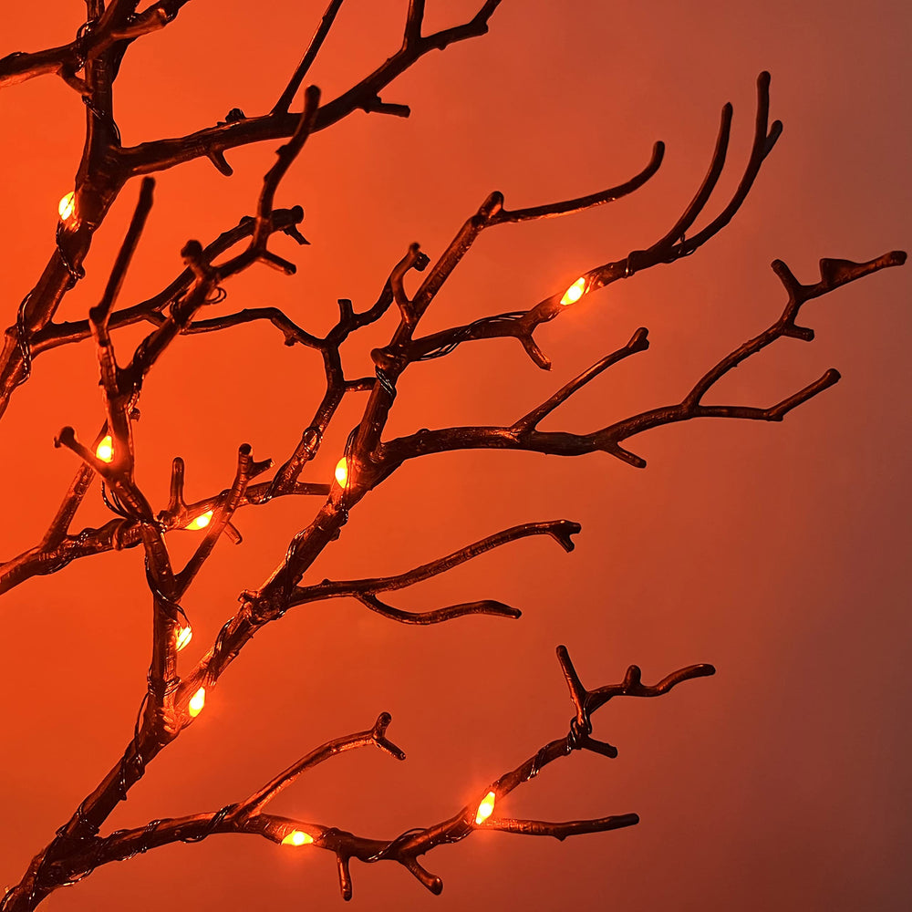LITBLOOM close-up of twig branches and orange LED lights for texture detail