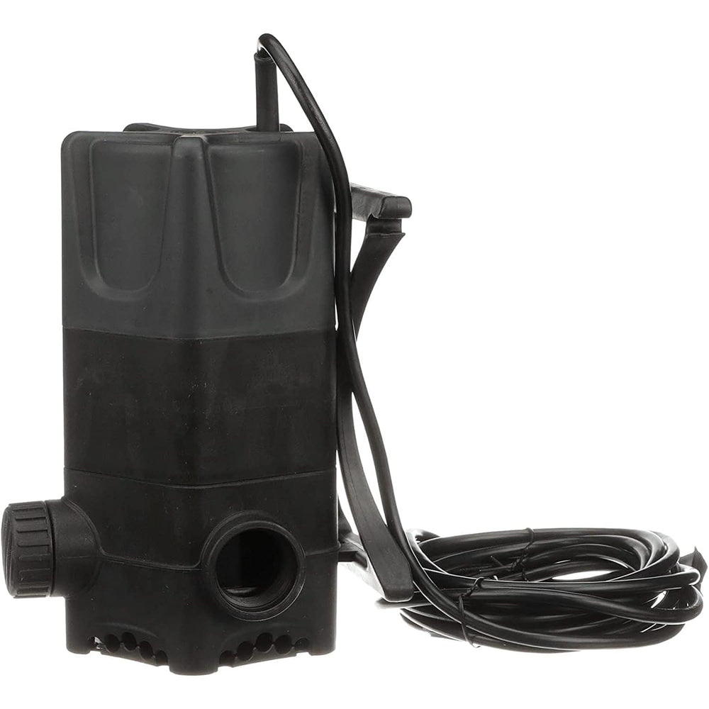 Little Giant pump installed in a backyard waterfall showing strong flow and landscaping integration