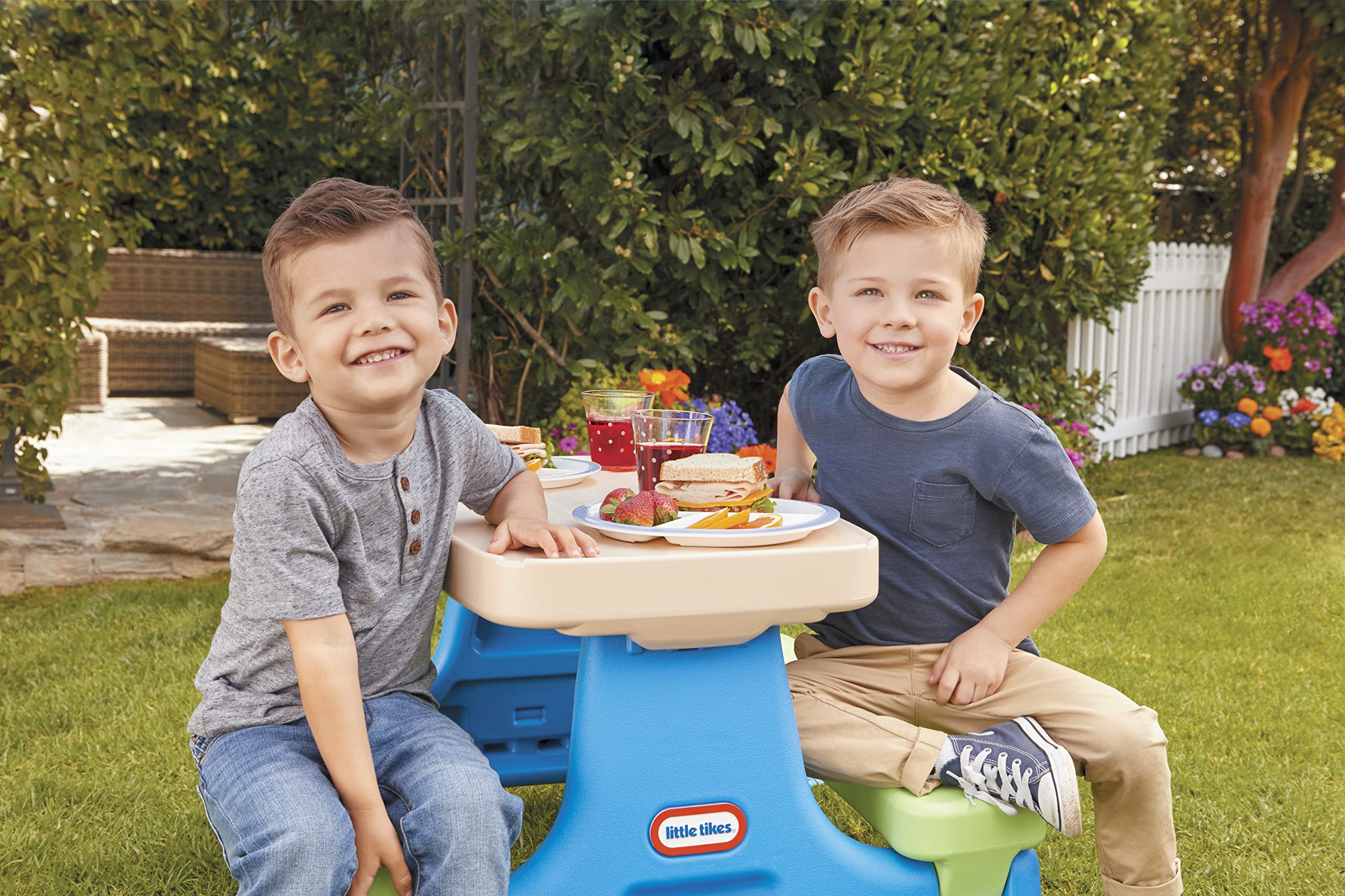 Little Tikes table folded flat for storage demonstrating easy portability