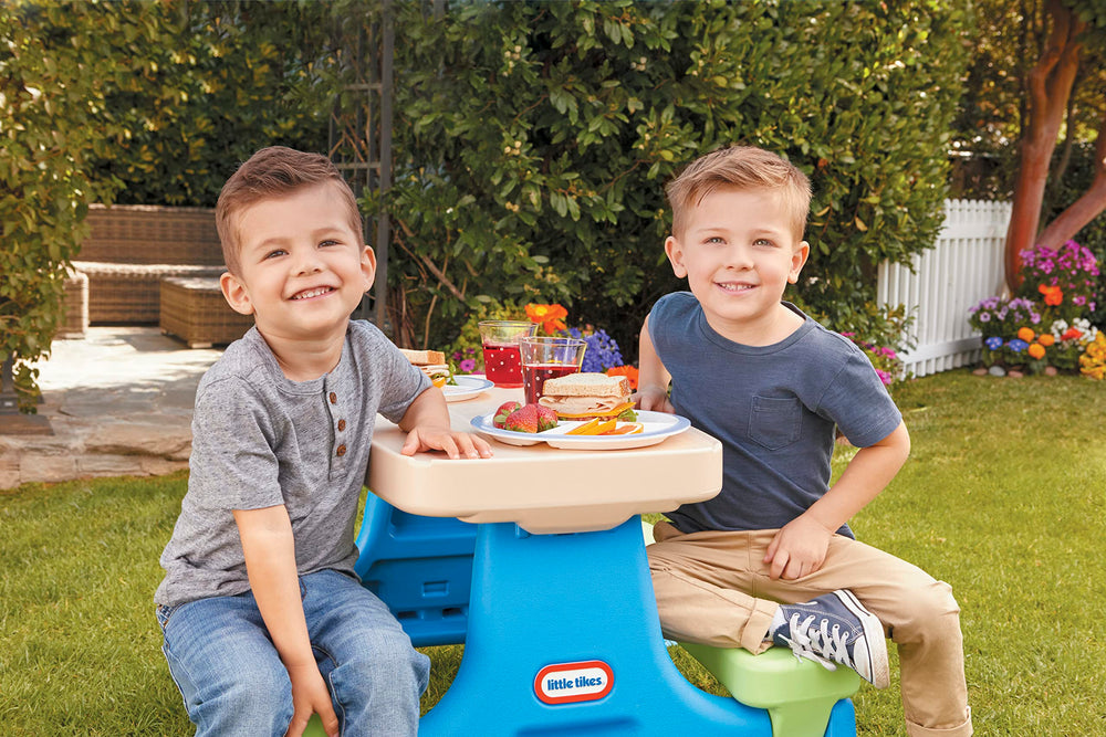 Little Tikes table folded flat for storage demonstrating easy portability