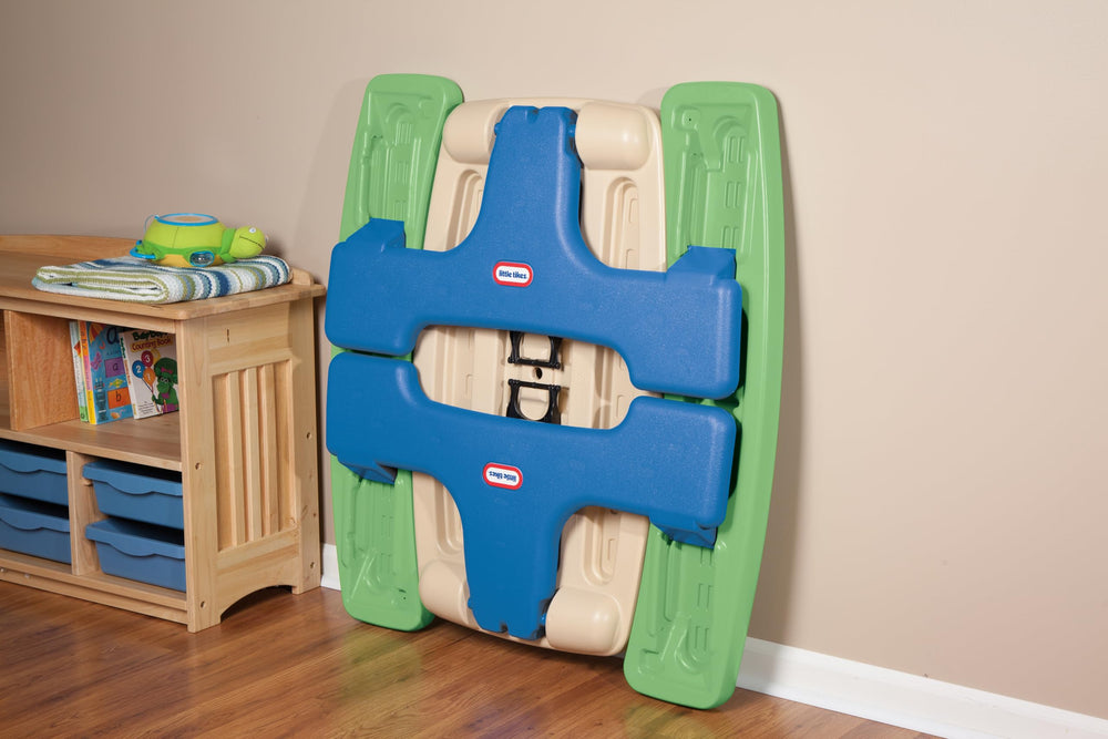 Little Tikes center tray and two cup holders keeping drinks and crayons organized